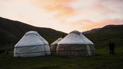 Yurts on the background of a beautiful sunset
