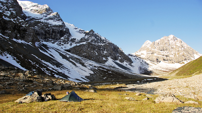 Overnight in tents under snowy mountains