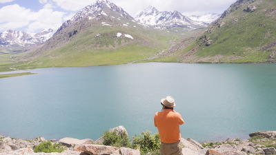 Against the background of the beautiful Son-Kul lake